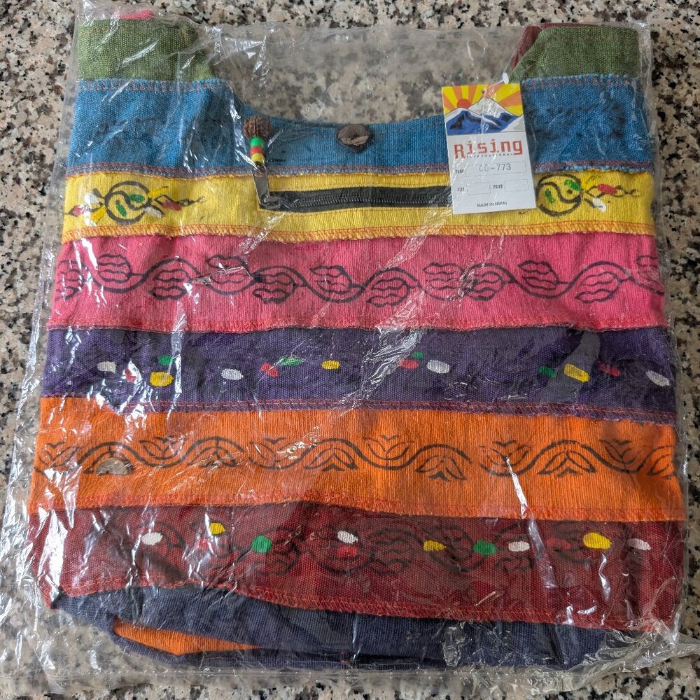 RISING INTERNATIONAL PATCHWORK BOHO SLING PURSE NEW